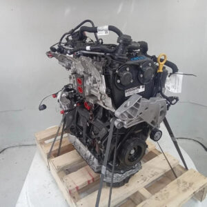 Used Volkswagen Tiguan DGV / DGVA 2.0L TSI turbo petrol engine strapped to a pallet, timing chain side with the dipstick tube visible